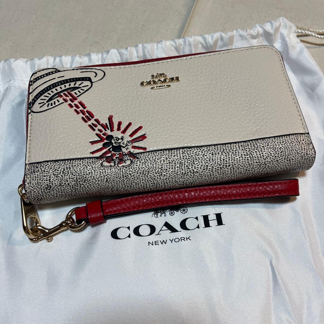 COACHストラップ付長財布 ディズニーキースヘリングコラボ