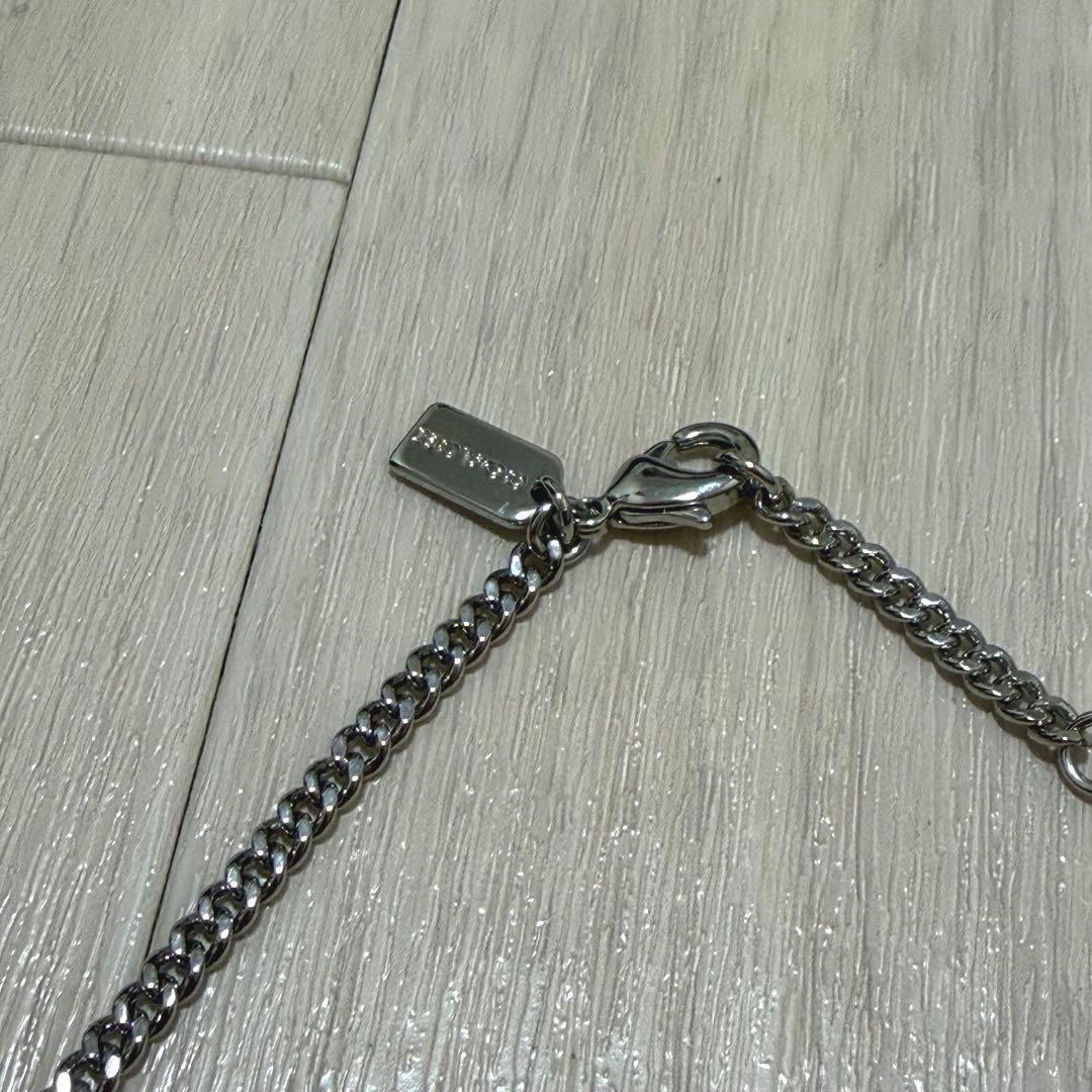 COACH レキシー ロゴ カラビナ 恐竜 ネックレス ペンダント ジルコニア