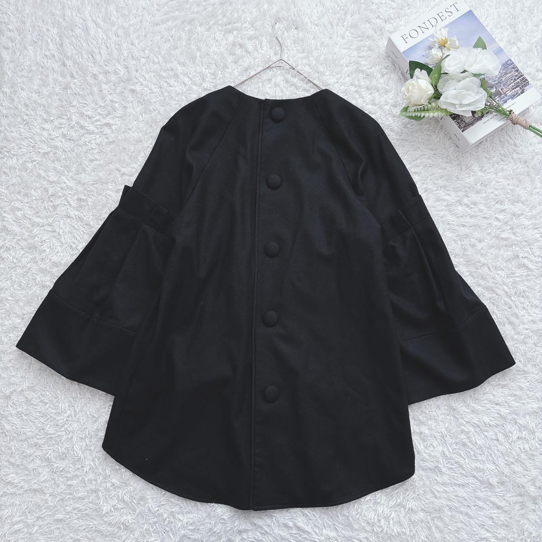 ADORE スーパー100 ストレッチサキソニーラグランフレアーブラウス