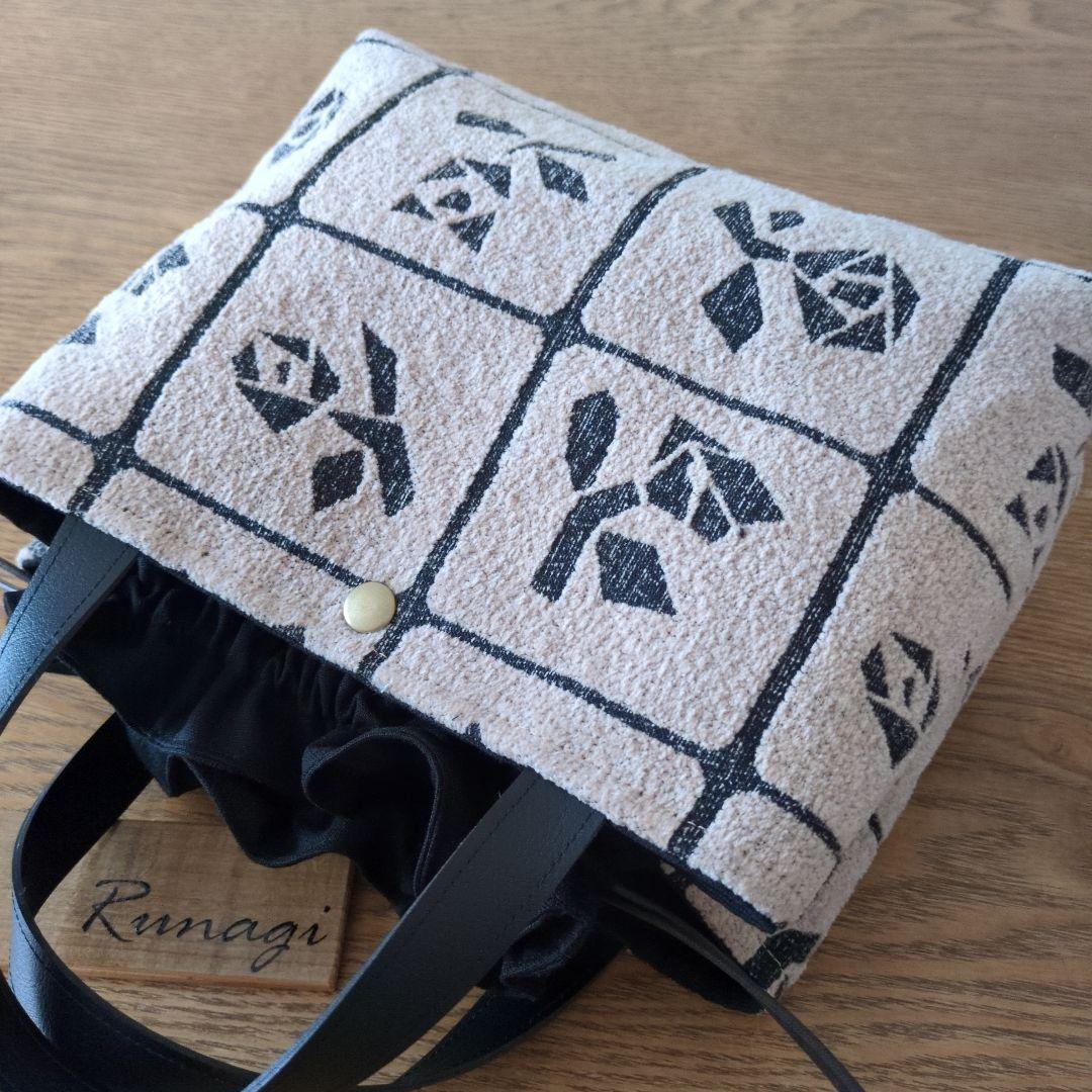 あおりポケットの巾着バッグ＊ミナペルホネン lulu