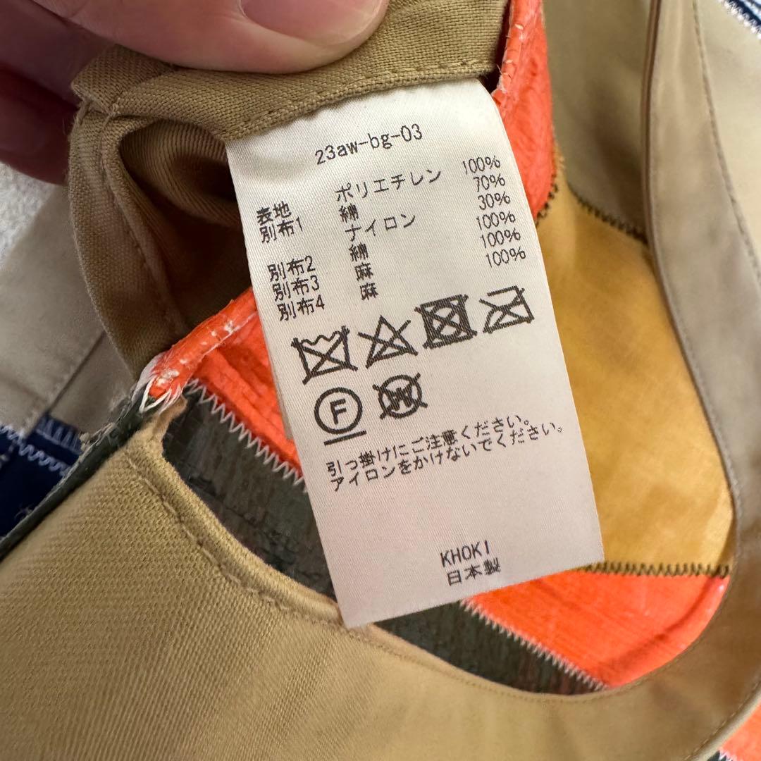 バッグ KHOKI 23AW Color-block vinyl tote bag