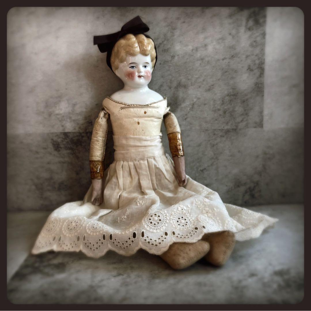 アンティーク ブロンド　チャイナヘッドドール　レザーボディ