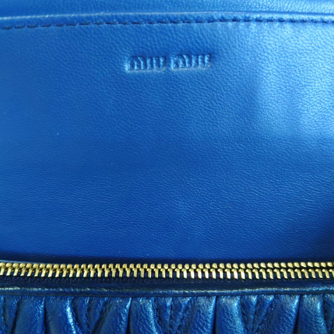 miu miu マテラッセ ネイビー 二つ折り長財布 5M1109