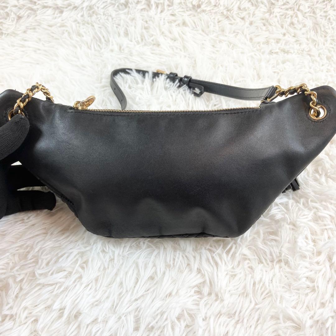 トリーバーチ ボディバッグ フレミング エンボス タッセル レザー ブラック