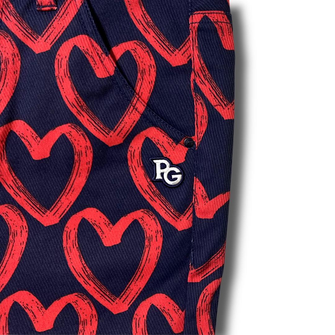 定31900円 1 パーリーゲイツ 落書きハート柄 ストレッチ ロングパンツ 紺