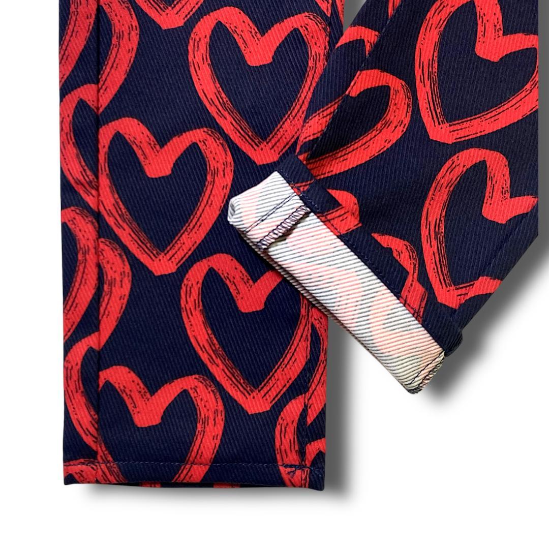 定31900円 1 パーリーゲイツ 落書きハート柄 ストレッチ ロングパンツ 紺