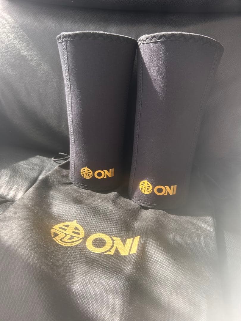 ONI ニースリーブS級品 黒 収納袋付き