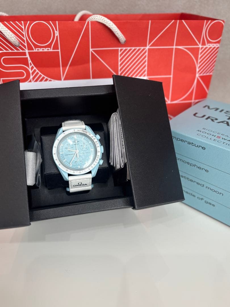 スウォッチ　オメガ　ウラヌス　水色