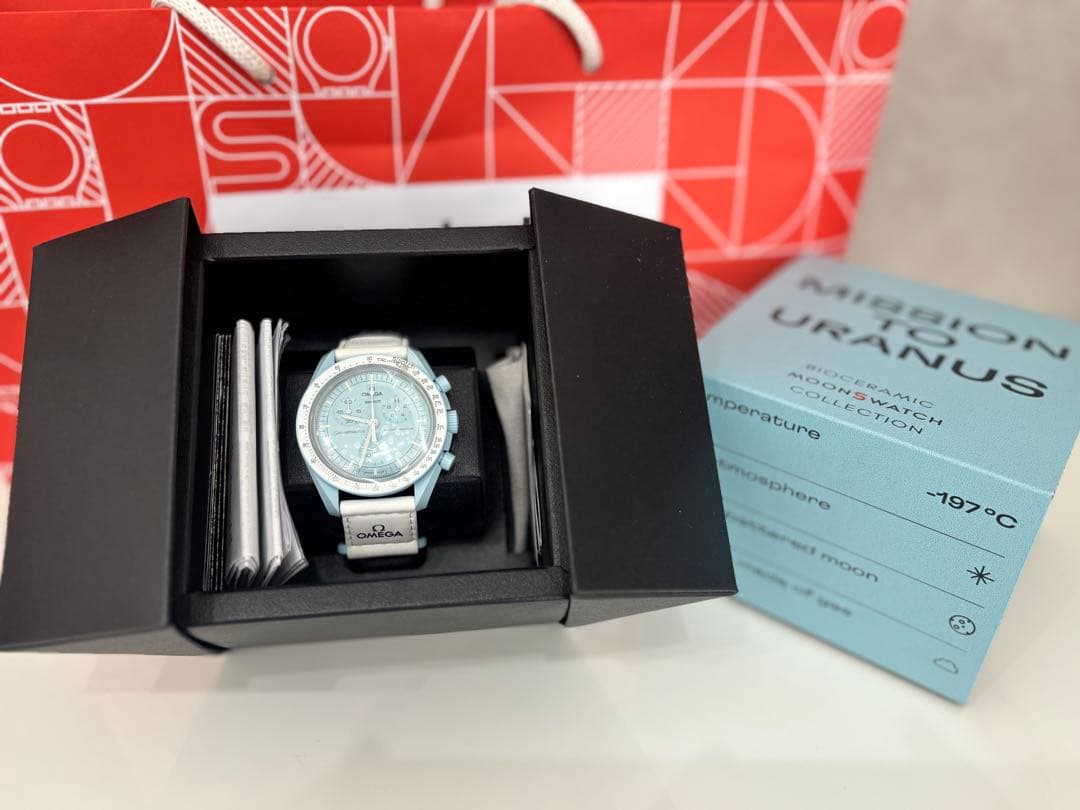 スウォッチ　オメガ　ウラヌス　水色