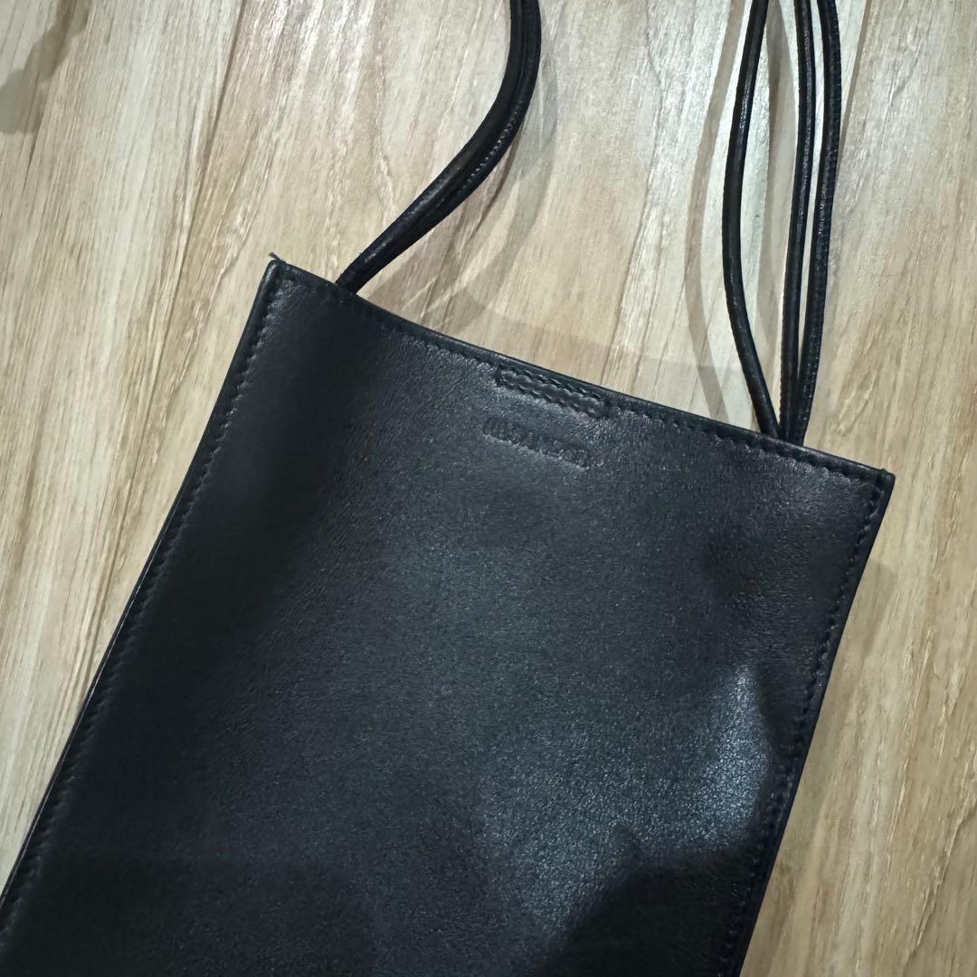 ブラック ショルダーバッグ 合成皮革 編み込みストラップ