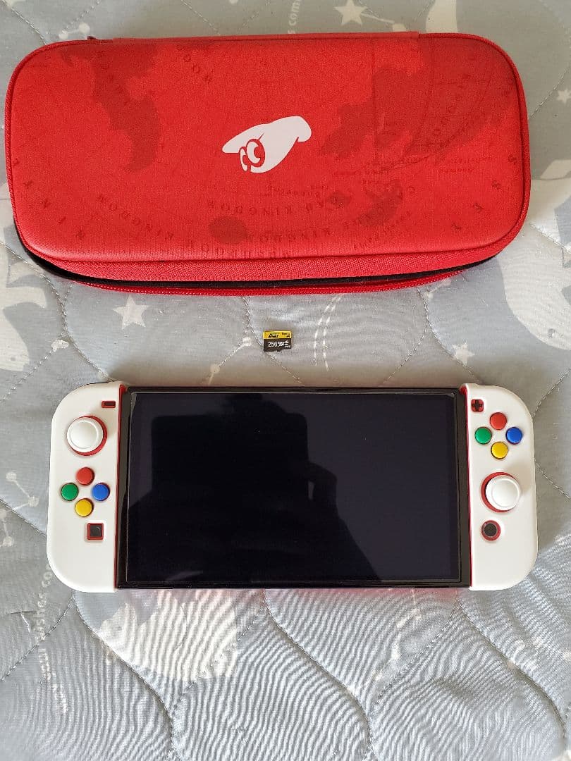 Nintendo Switch 赤/有機EL、本体 キャリングケース付き。