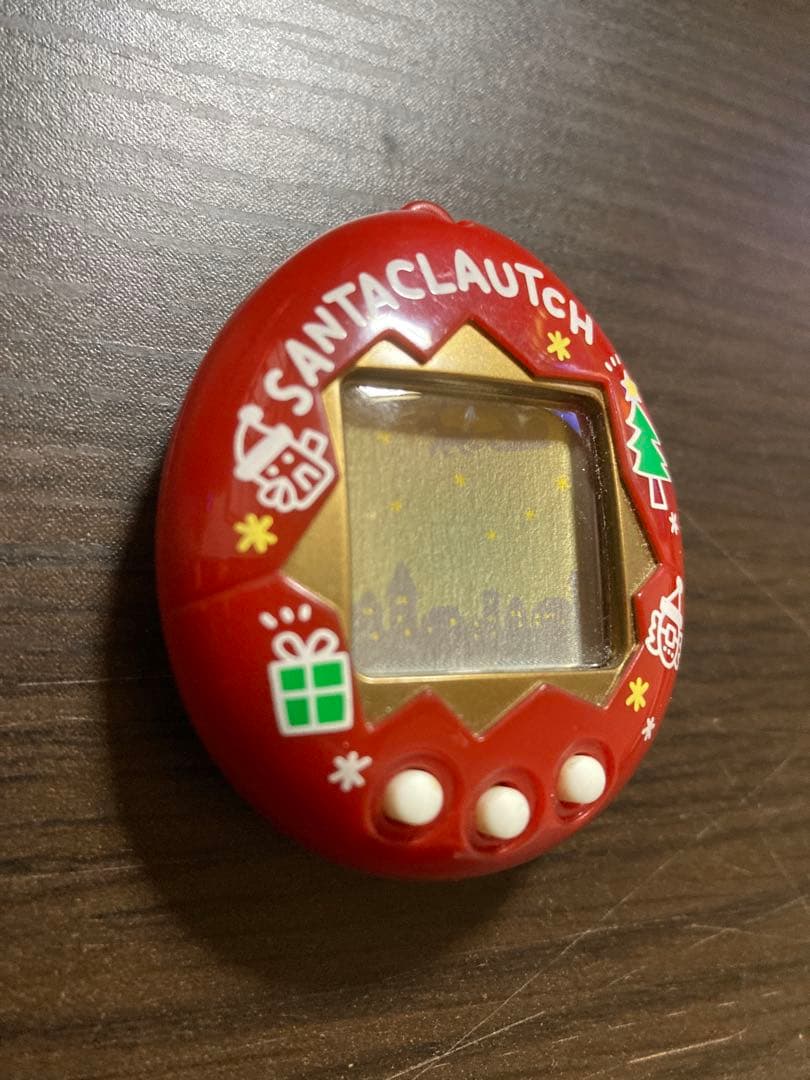 【動作確認済・ジャンク】サンタクロっちのたまごっち　レッド　※裏蓋両側ビス欠け