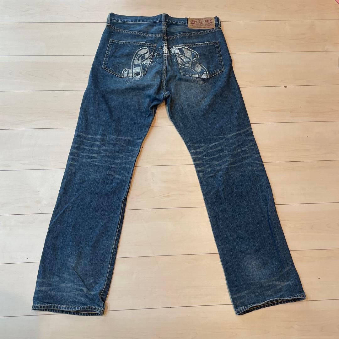 APE デザインデニムパンツ 顔プリント