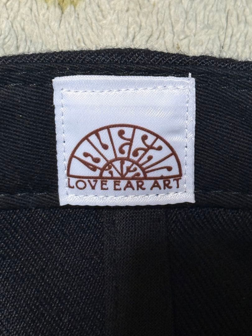 木村拓哉着用 LOVE EAR ART スナップバックキャップ