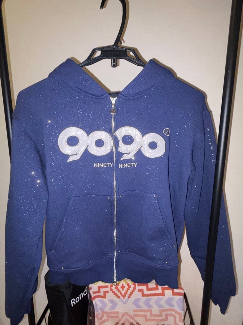 はページ 9090 OG Logo Glitter Zip Hoodie