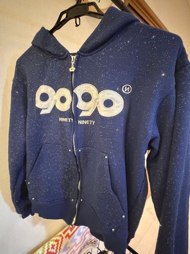 はページ 9090 OG Logo Glitter Zip Hoodie