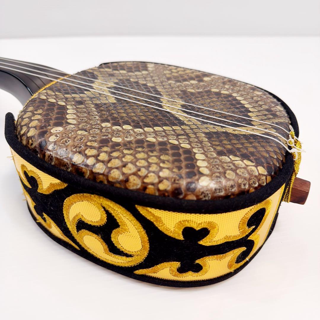 【かずさん専用】沖縄三線 本蛇皮 強化張 真壁型 爪付 ハードケース付 ウマ