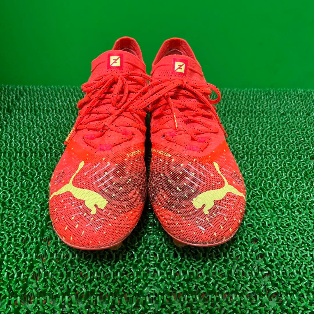 プーマ サッカースパイクフューチャーZ 1.4 HG/AG(オレンジ×イエロー)