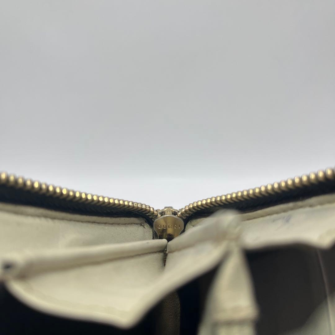 鑑定済　GUCCI グッチ ラウンドファスナー財布 GG リボン シマレザー