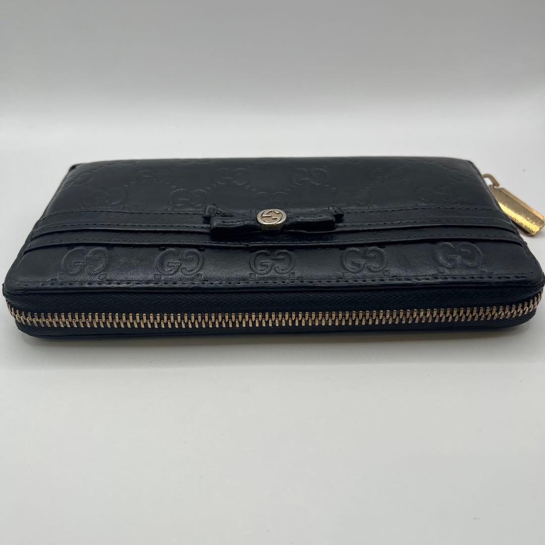 鑑定済　GUCCI グッチ ラウンドファスナー財布 GG リボン シマレザー