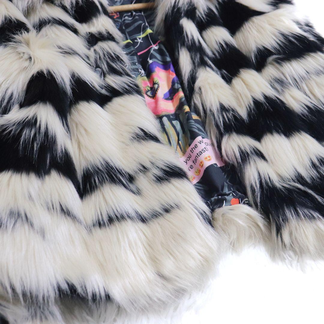 Desigual デシグアル バックデカ目玉 裏地総柄 フェイクファーコート L