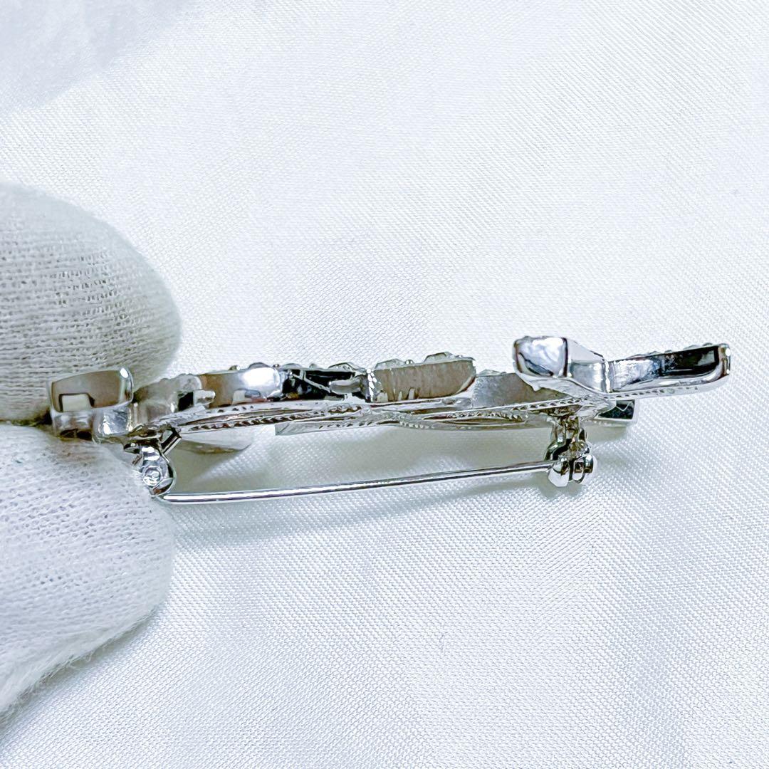 イヴサンローラン ブローチ カサンドラ YSLロゴ　ラインストーン シルバー