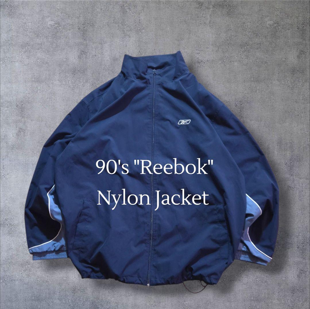 90s Reebokリーボックナイロンジャケット 刺繍ロゴ万国旗タグビッグサイズ