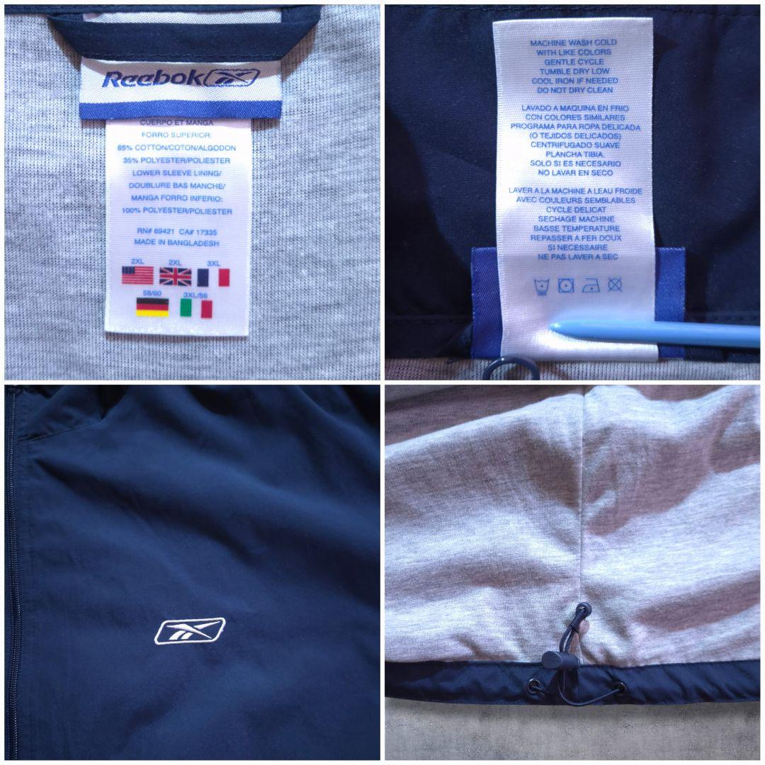 90s Reebokリーボックナイロンジャケット 刺繍ロゴ万国旗タグビッグサイズ