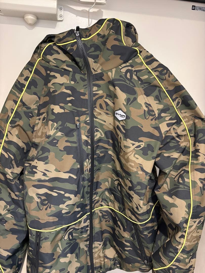 Syna World カモ柄ナイロンジャケット シナワールド