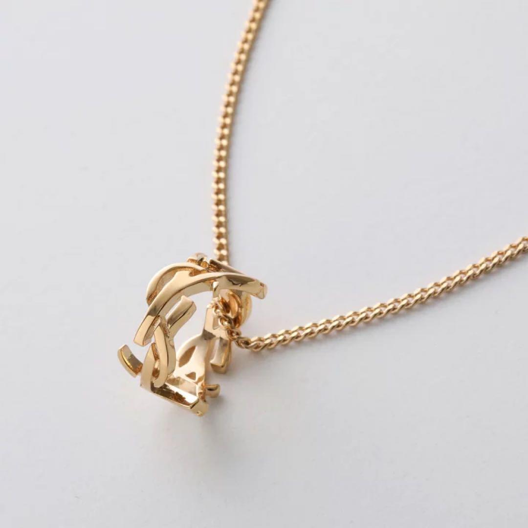 カサンドラ YSLモノグラム ツイスト ペンダント