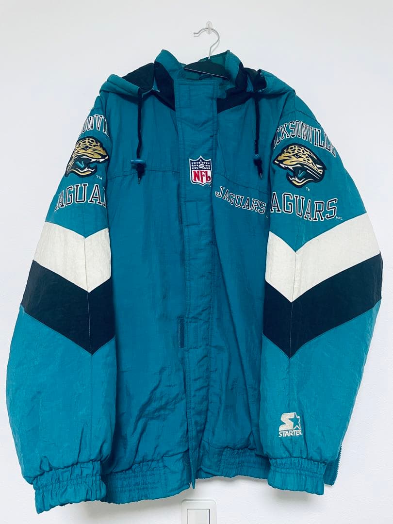 レア90s《スターター》NFLジャガーズ中綿 刺繍ナイロンジャケット