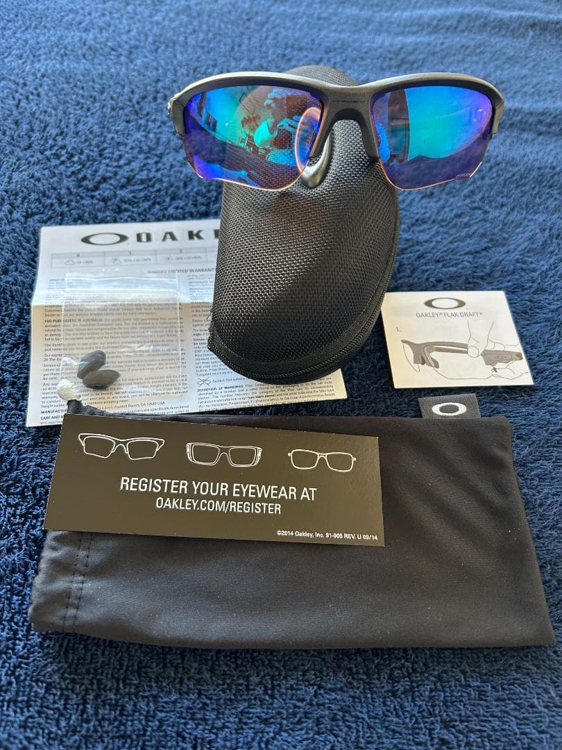 Oakley サングラス ブラックフレーム ブルーレンズ
