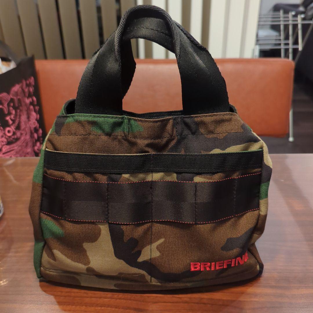 か*け様 BRIEFING 迷彩柄 ラウンドバッグ