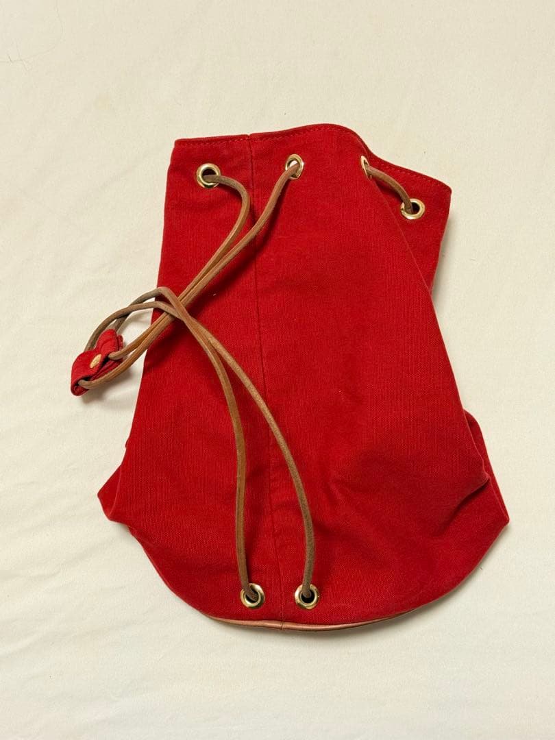エルメス 赤 キャンバス ドローストリングショルダーバック