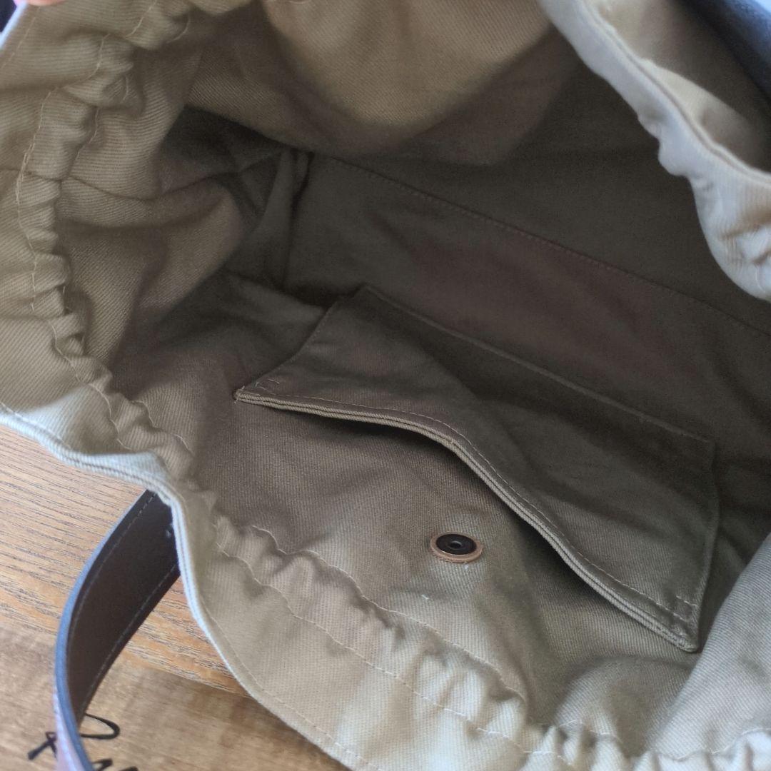 【1569】あおりポケットの巾着バッグ＊ミナペルホネン