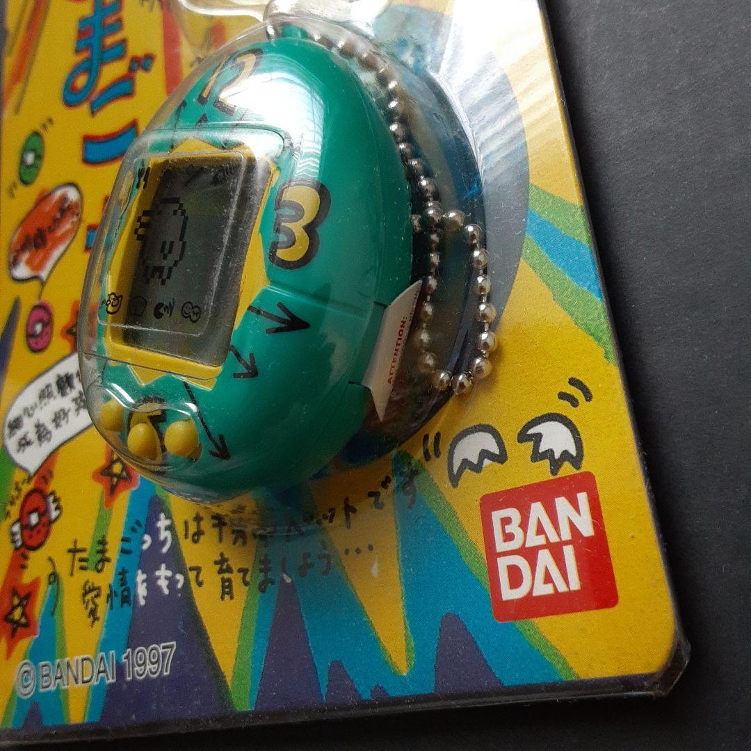 【未開封・新品】 BANDAI 初代たまごっち ブルー　水色　時計柄　香港版