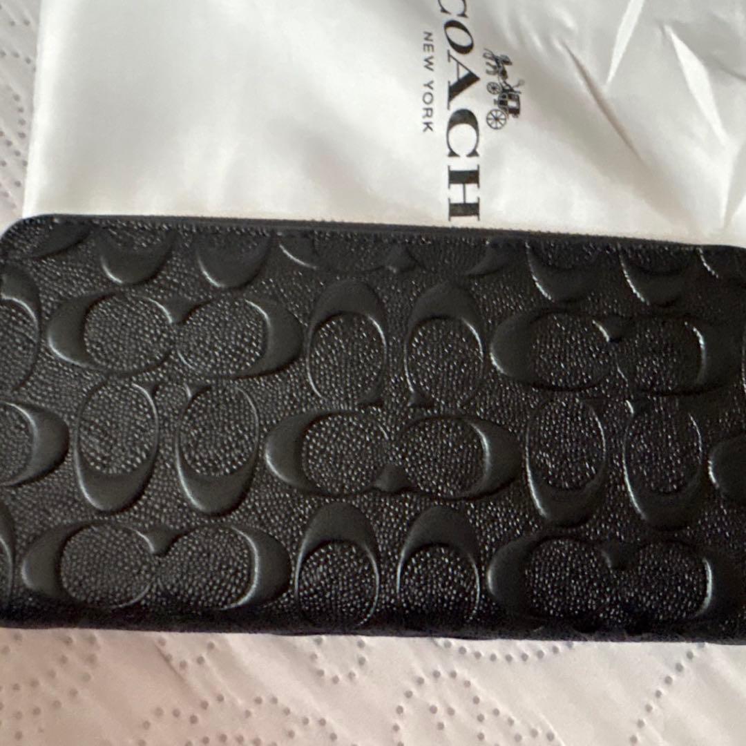 ✨新品未使用✨COACH ブラック レザー 長財布　保存袋付き　即購入⭕️