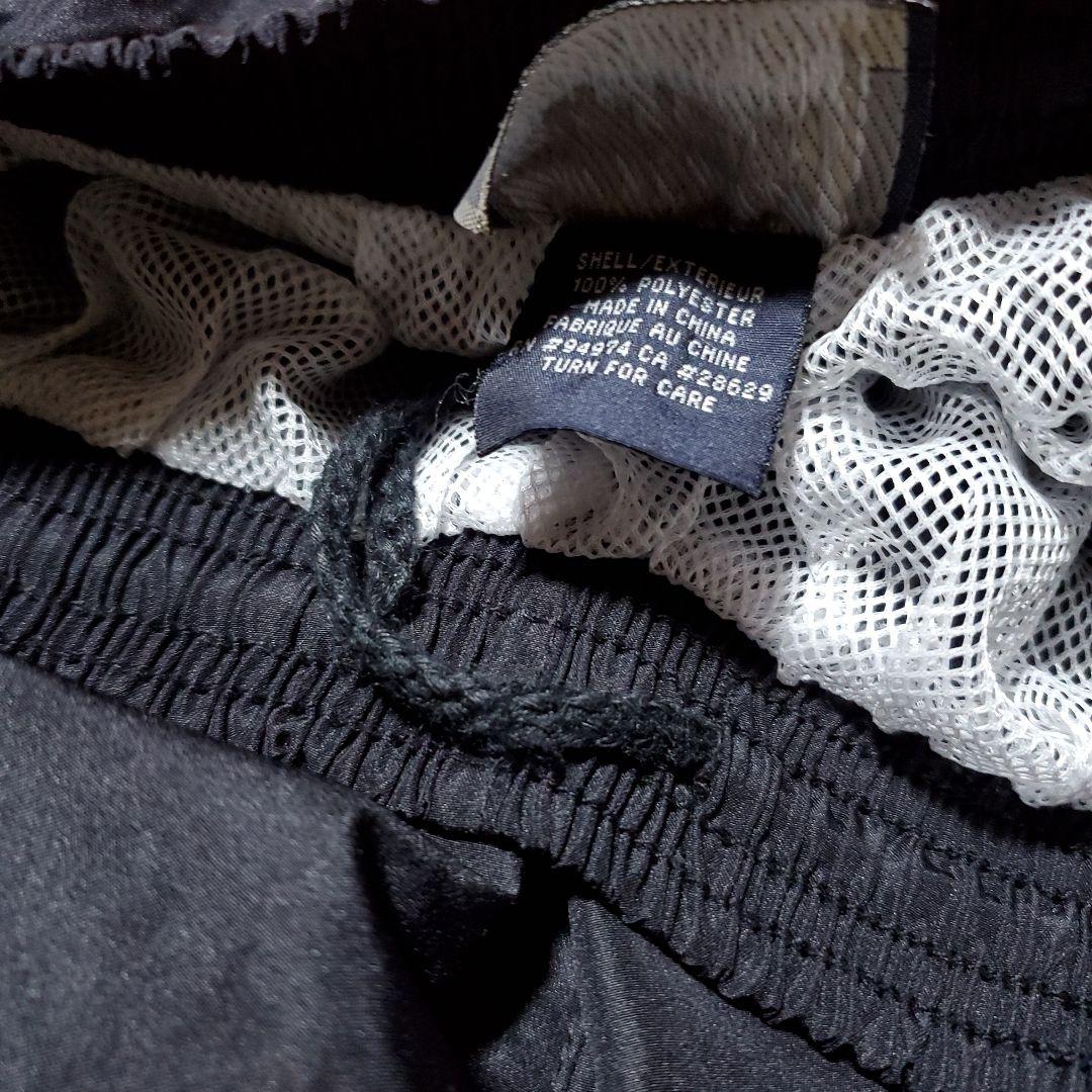 ストゥーシースポーツ　黒ナイロンパーカー上下セット　Lサイズ