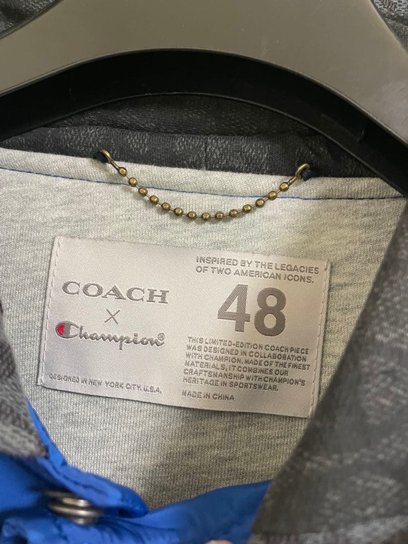 coach × Champion フーディージャケット