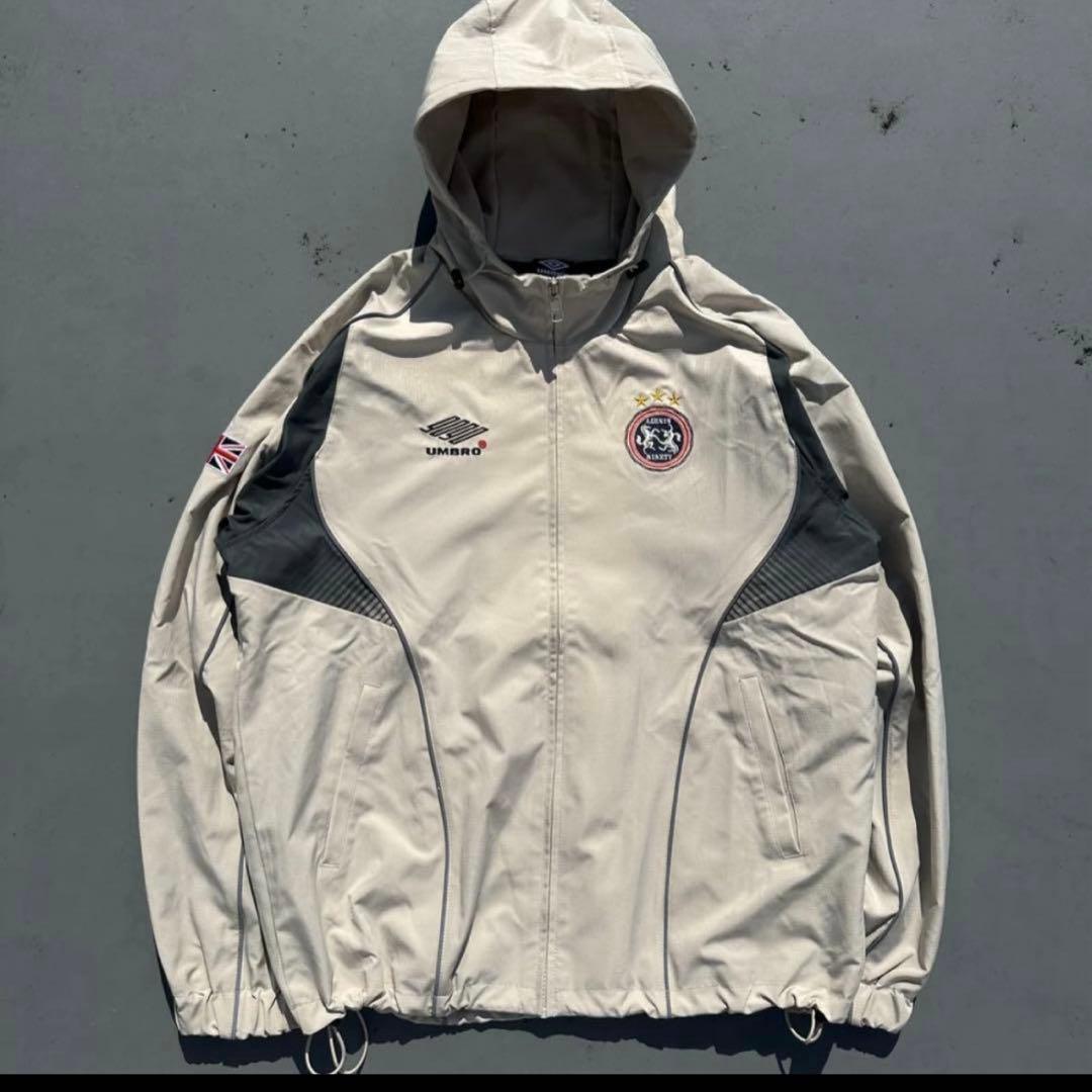 ジャケット・アウター 9090 umbro Gradation Nylon Hooded Jacket