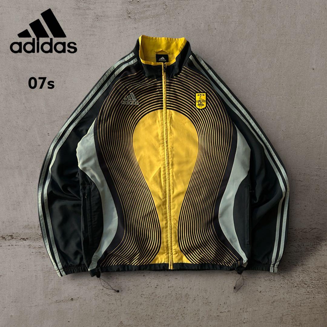 希少adidasアディダスARIS FCナイロンジャケットドローコード刺繍ロゴ