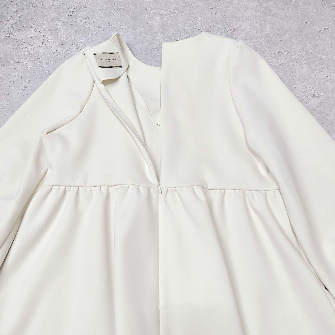 UNITED ARROWS SPONGY パールモチーフペプラムブラウス　38