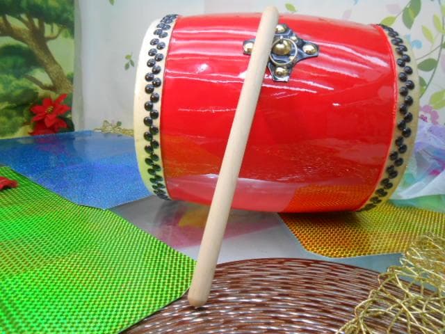 新品未使用(送料無料)12.500円 エイサー大太鼓24cm*31cm 撥付