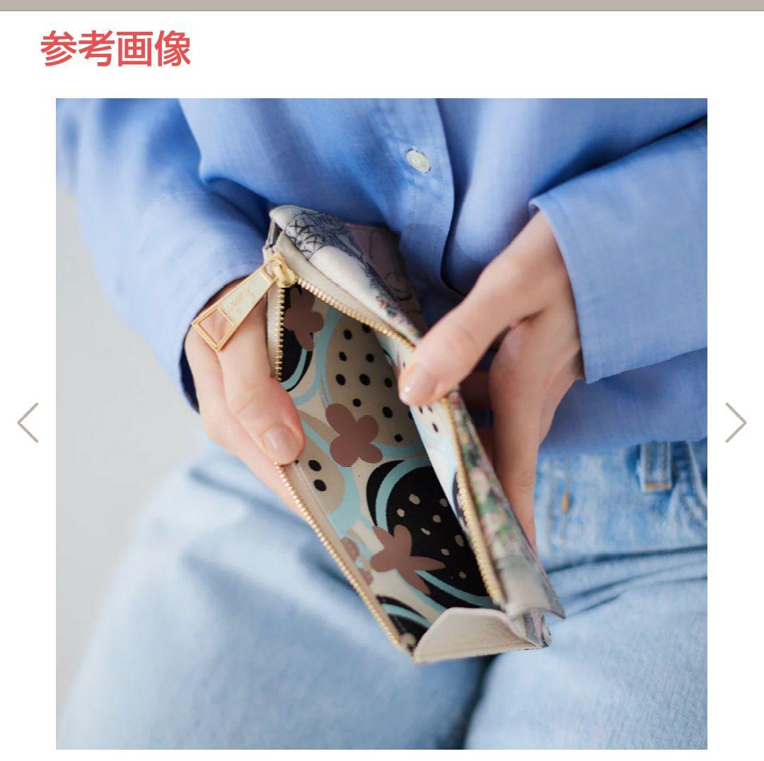 美品・IANNE（イアンヌ）フラグメントケースのような長財布 フェイス柄