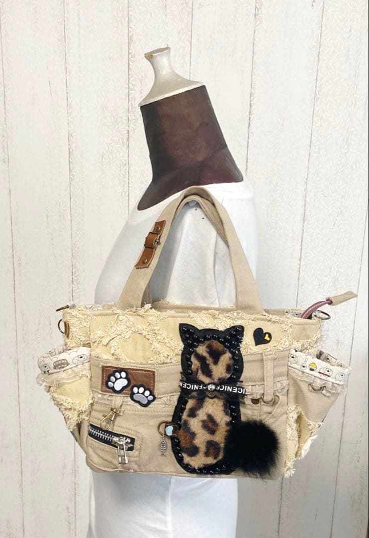デニムリメイクバックS 茶フリンジ猫