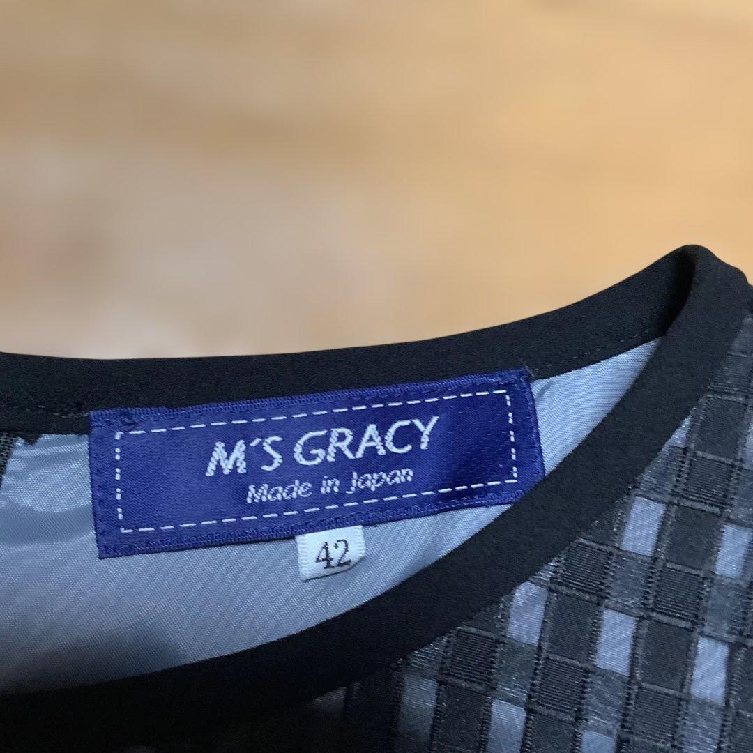 【新品】M'S GRACY 花柄ワンピース42。黒。