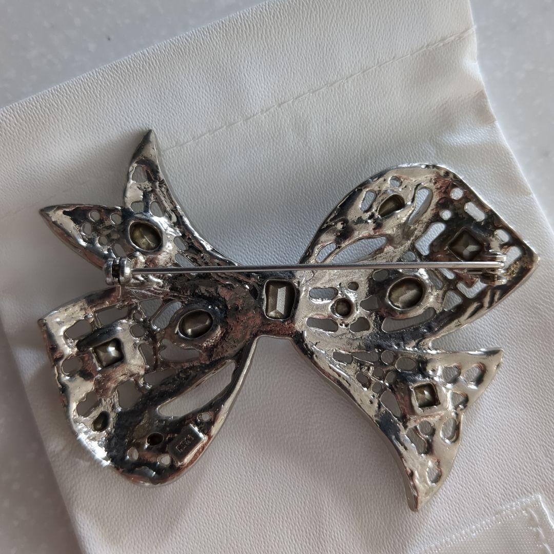 petite robe noire プティローブノアー リボンブローチ