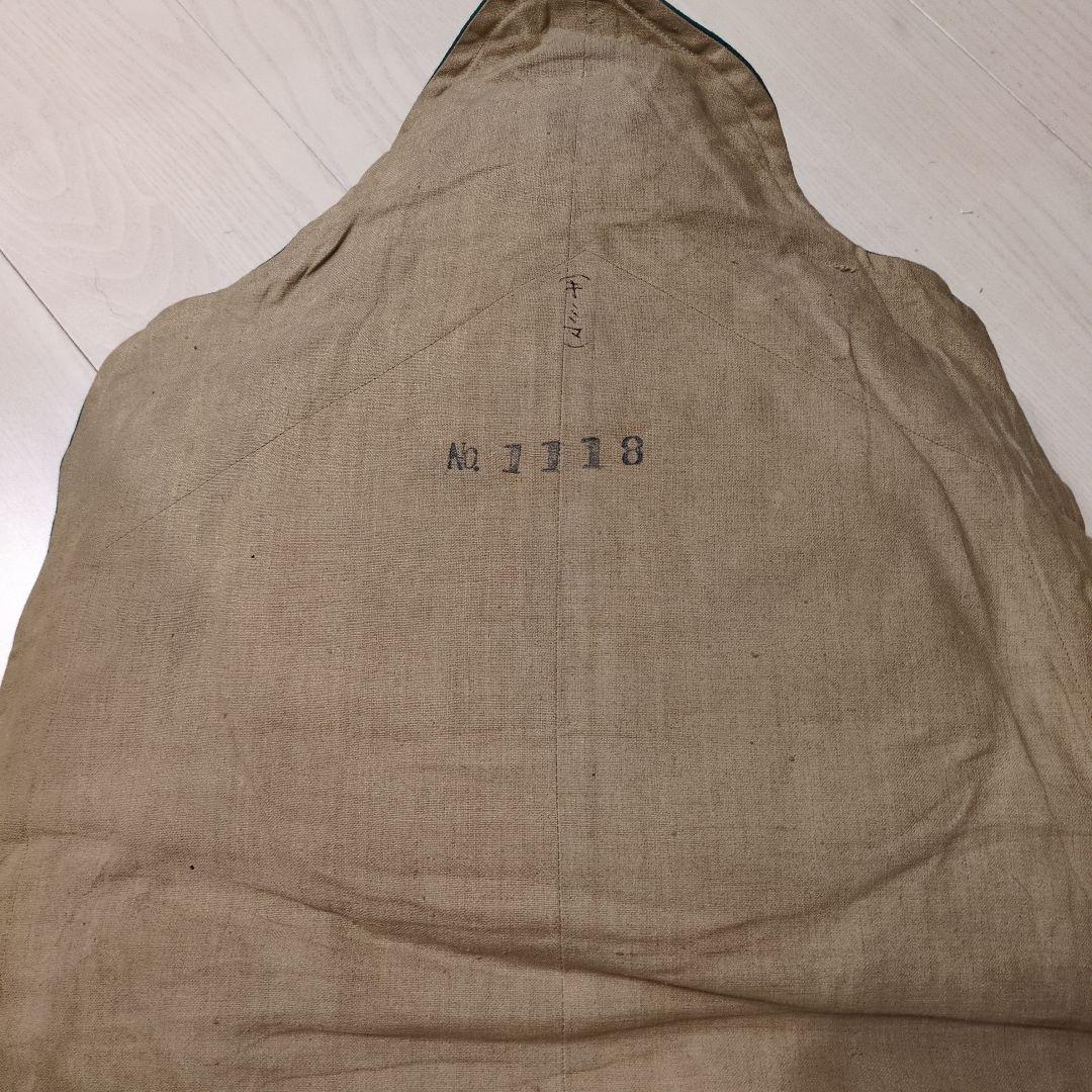 クマの毛皮ラグ ブラウン グリーン縁取り