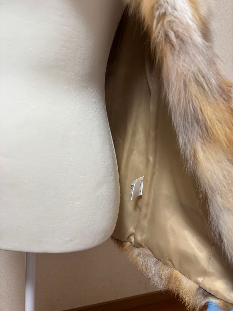 ベージュ系ファー ノーカラーベスト　グレースコンチネンタル