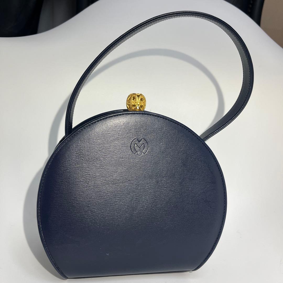 Mila schon ミラショーン 丸型 パーティーバッグ レザー 巾着